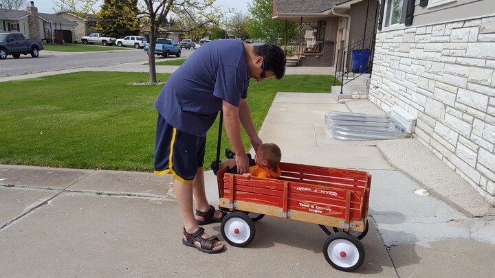Playing With Red Wagon